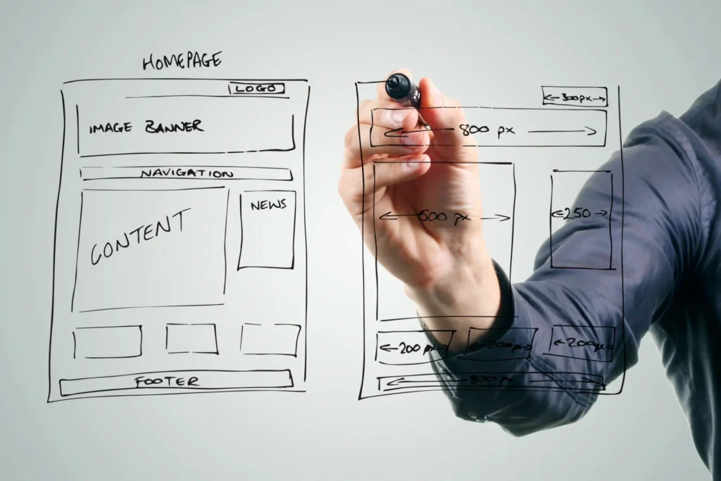 Man brainstorming design ideas for his website